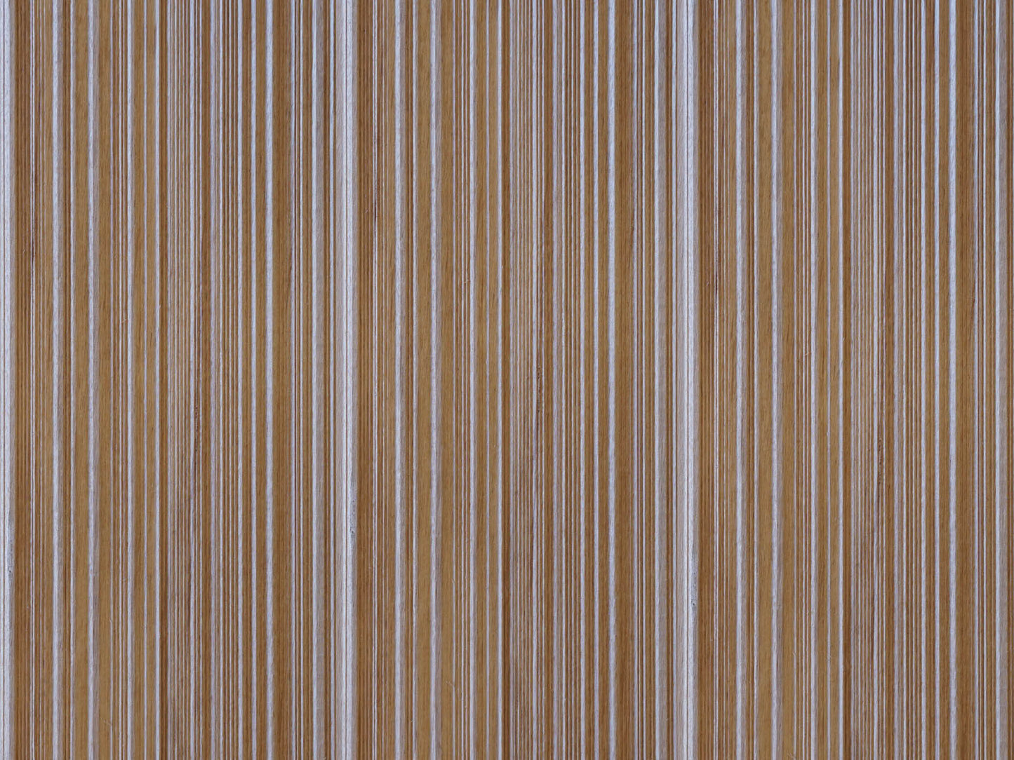 Side by side close up of Weldtex tongue & groove alder hardwood plank consisting of a combed, striated, brushed wood appearance common in mid-century modern homes and design