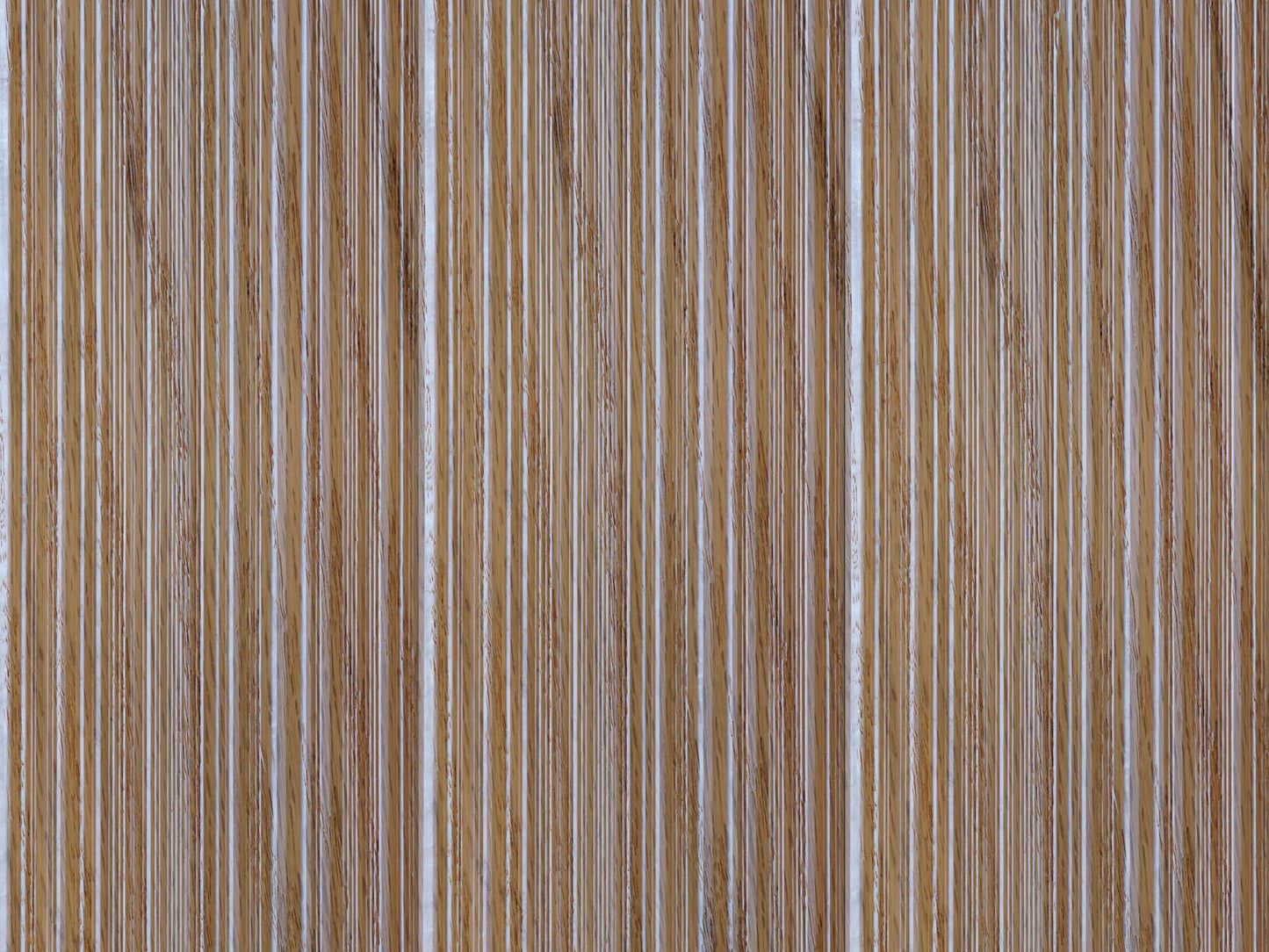 Side by side of Weldtex tongue & groove red oak hardwood plank consisting of a combed, striated, brushed wood appearance common in mid-century modern homes and design