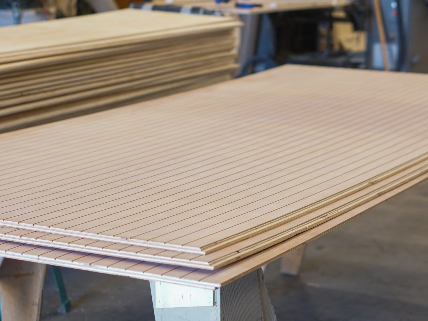 Stack of three Thinline patterned plywood consisting of a 1/8” grooves, 1⅝” on center, commonly used as siding and paneling on Eichler homes and other mid-century modern design