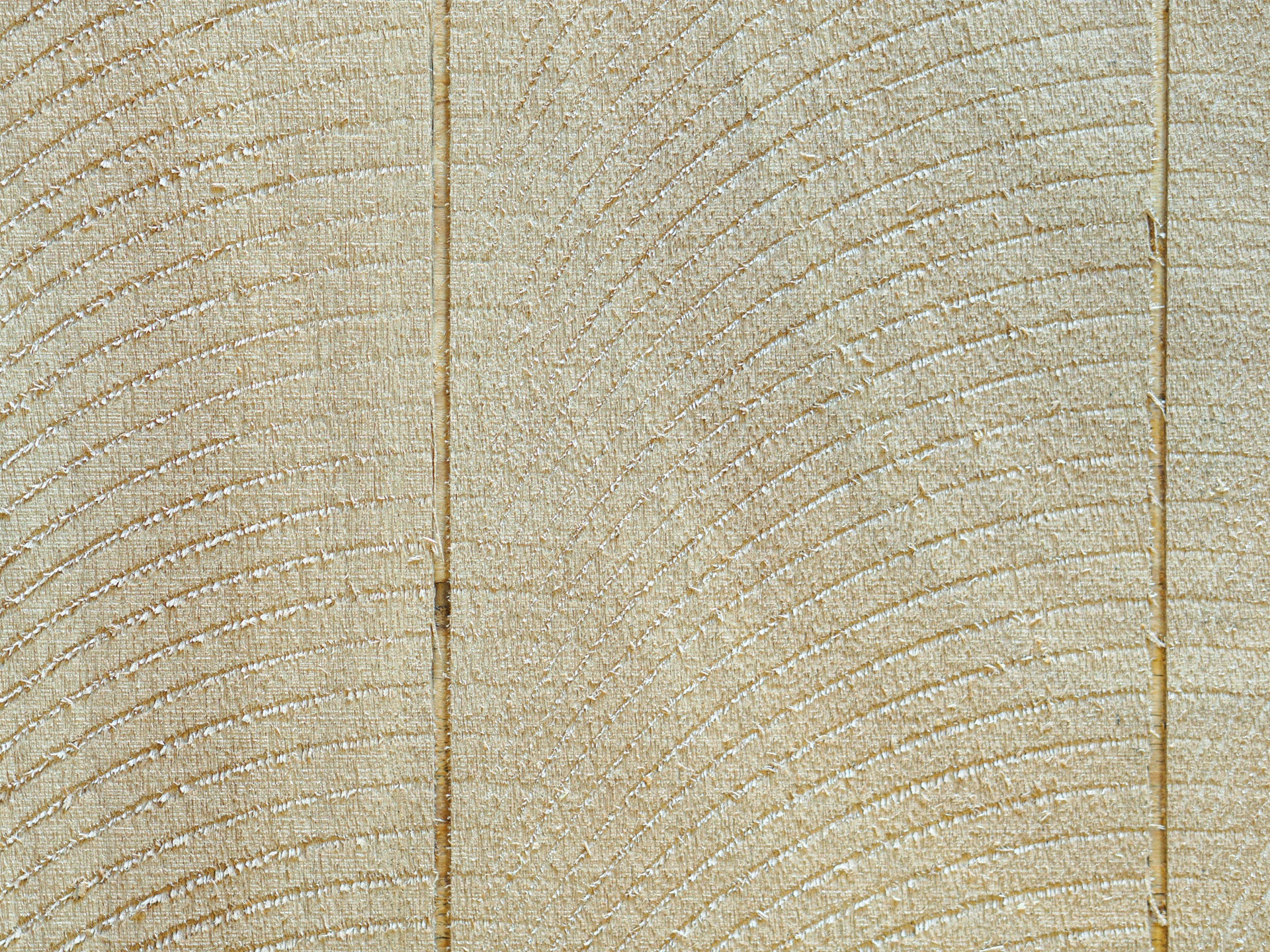 Close up of Vintage Plywood Millworks' Planktex pattern showing the grooves and saw swirl marks