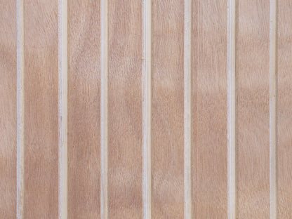 Close up of Wideline patterned plywood consisting of a 3/8" groove, 2" on center, commonly used as siding and paneling on Eichler homes and other mid-century modern design