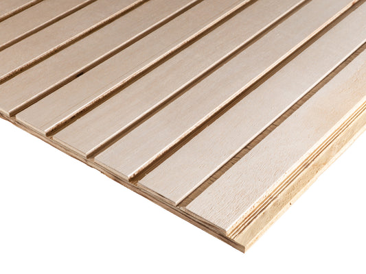 Closeup of a stack of three sheets of Wideline patterned plywood consisting of a 3/8" groove, 2" on center, commonly used as siding and paneling on Eichler homes and other mid-century modern design